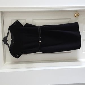 Black dress with open flap